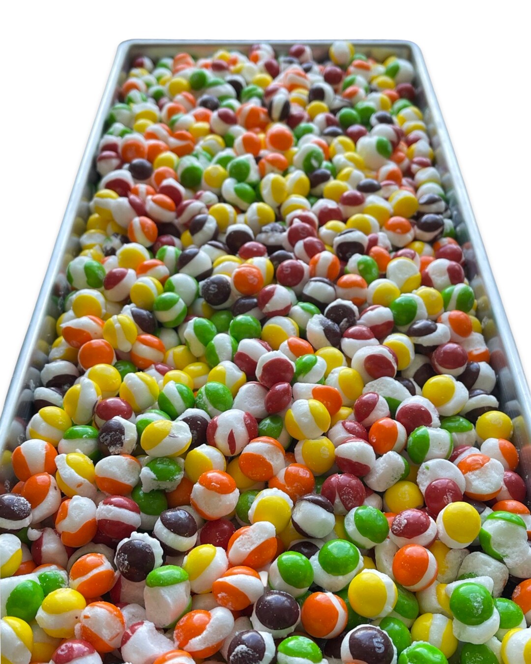 A freeze-dryer tray full of freshly puffed rainbow candy
